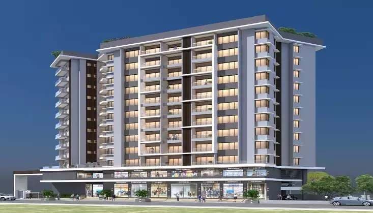 Sahil Heights, a lit multi-storey apartment tower above a retail plinth